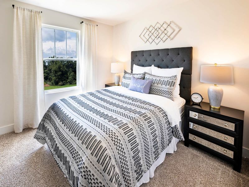 Secondary bedrooms make perfect guest rooms. Photography from City Station Townes. Secondary bedrooms make perfect guest rooms. Photography from City Station Townes.