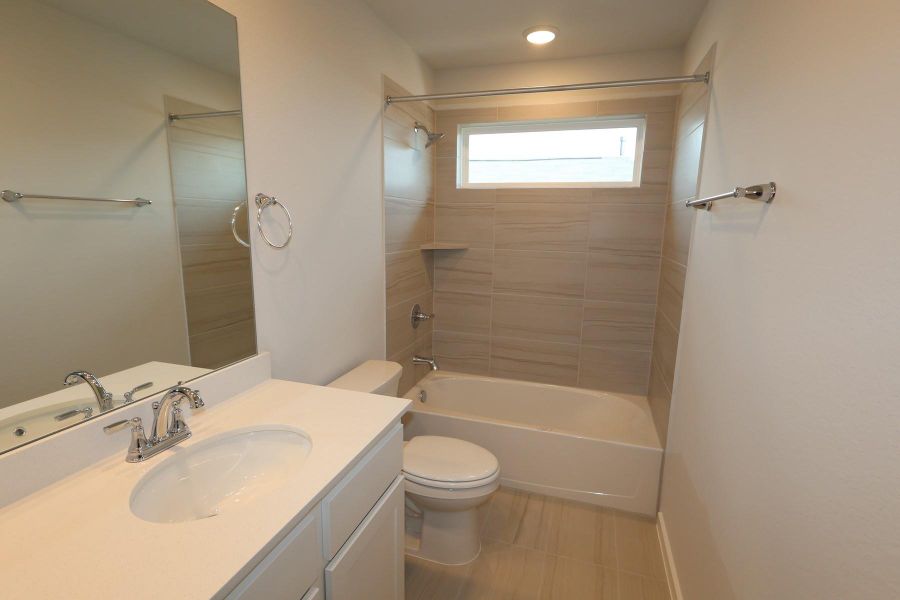 Furnished interior view inside a new home in The Cove at Mason Woods, Cypress (Image 8).