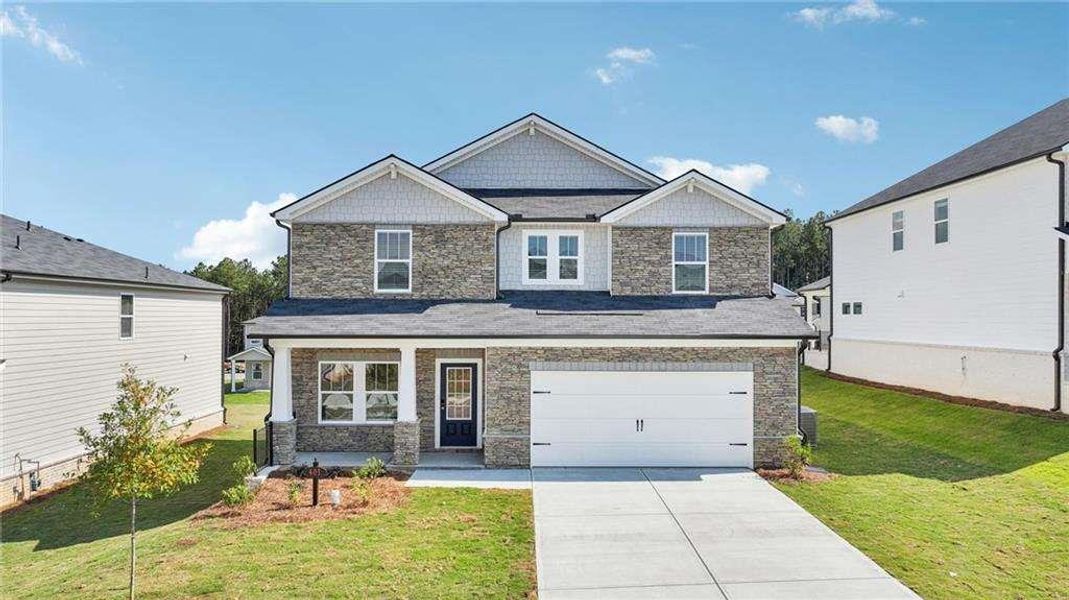 Front exterior of a new home in Parkside at Grayson, Grayson, GA, highlighting curb appeal (Image 1).