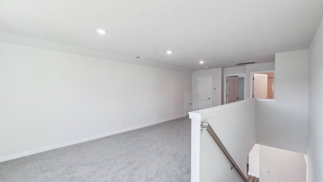 Representative unfurnished interior of a home built from the Willow by D.R. Horton in Westport, York (Image 32).
