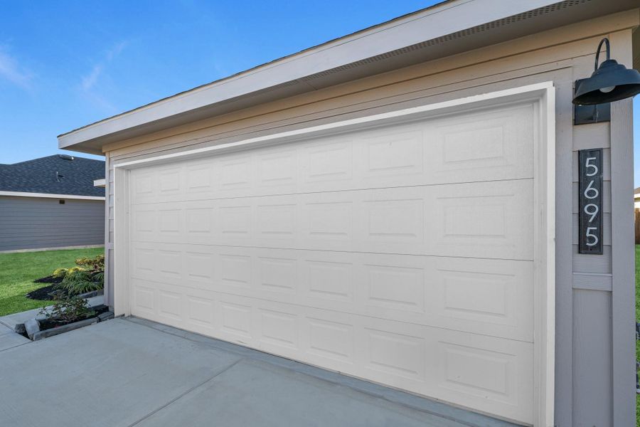 Front exterior of a new home in Reserve at Mallard Lakes, Orange, TX, highlighting curb appeal (Image 2). Front exterior of a new home in Reserve at Mallard Lakes, Orange, TX, highlighting curb appeal (Image 2).
