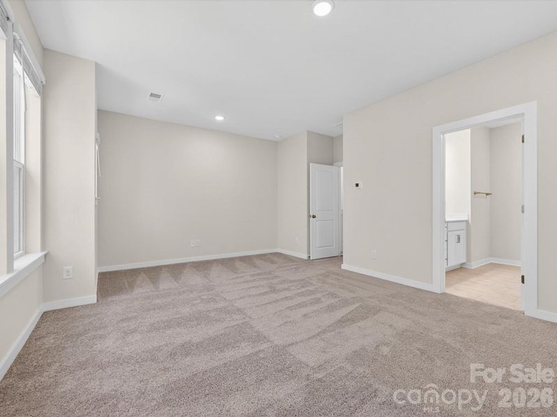 Spacious, unfurnished interior of a new home in Central Living at Craig, Charlotte (Image 12). Spacious, unfurnished interior of a new home in Central Living at Craig, Charlotte (Image 12).