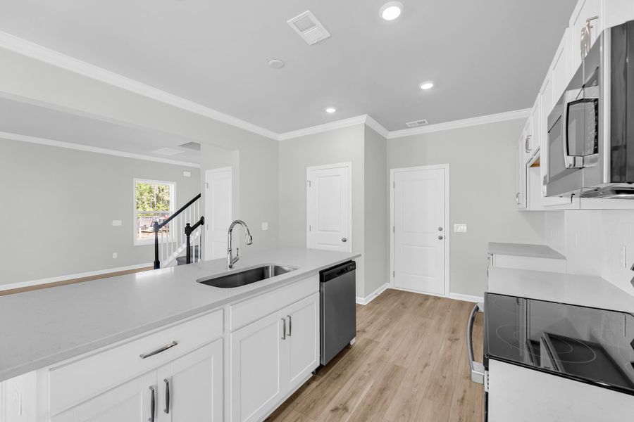 Furnished interior view inside a new home in Central Creek, Goose Creek (Image 8).