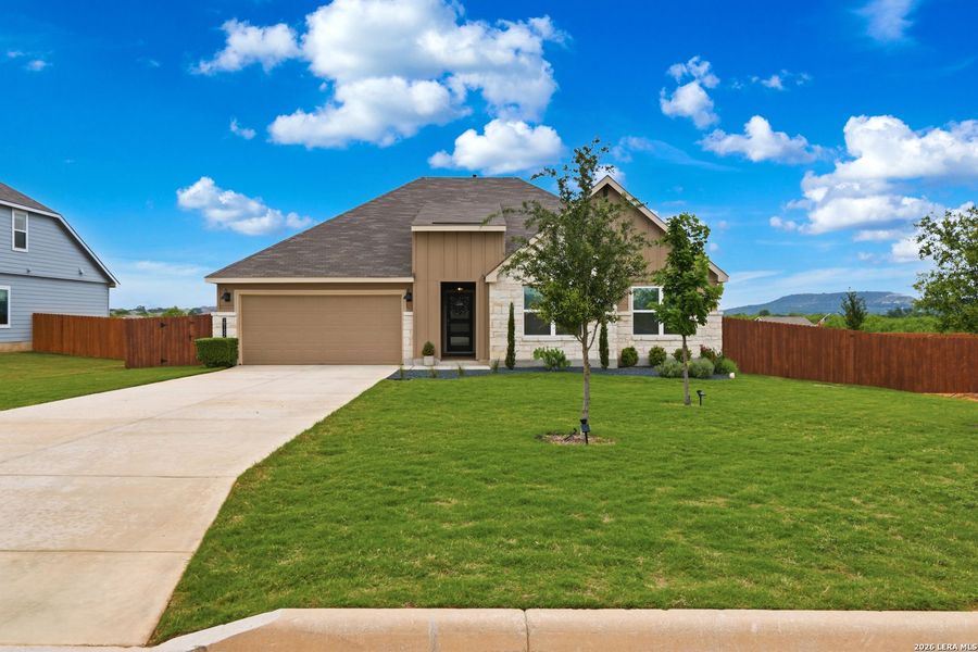 Front exterior of a new home in Copper Canyon, Bulverde, TX, highlighting curb appeal (Image 24).