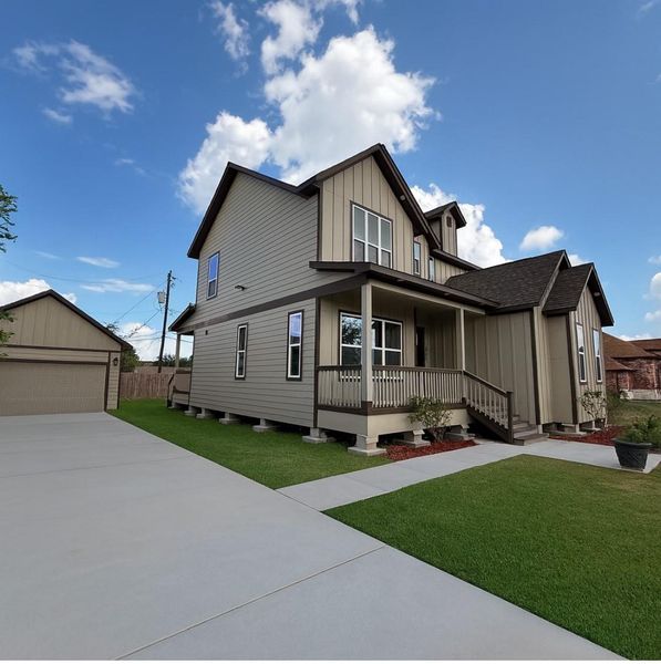 Front exterior of a new home in , Pasadena, TX, highlighting curb appeal (Image 19).