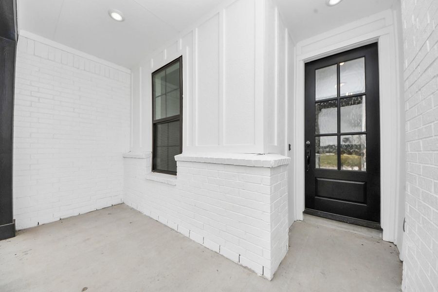 Exterior details and patio area of a home in , Missouri City (Image 25).