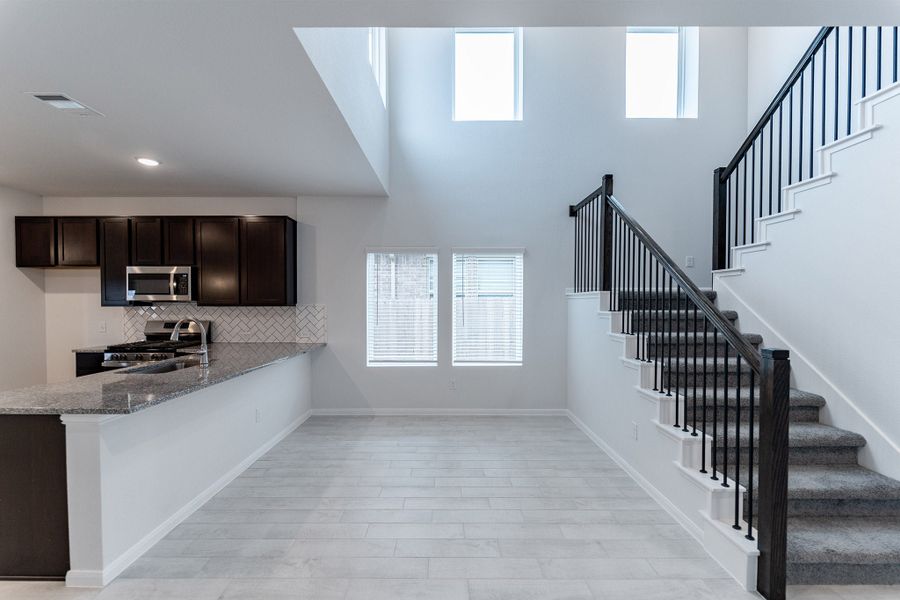 Furnished interior view inside a new home in Briarwood, Elgin (Image 2).