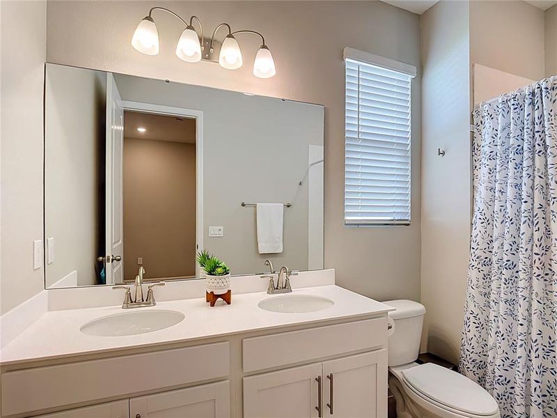 Furnished interior view inside a new home in Seasons at Big Sky, Kissimmee (Image 36).