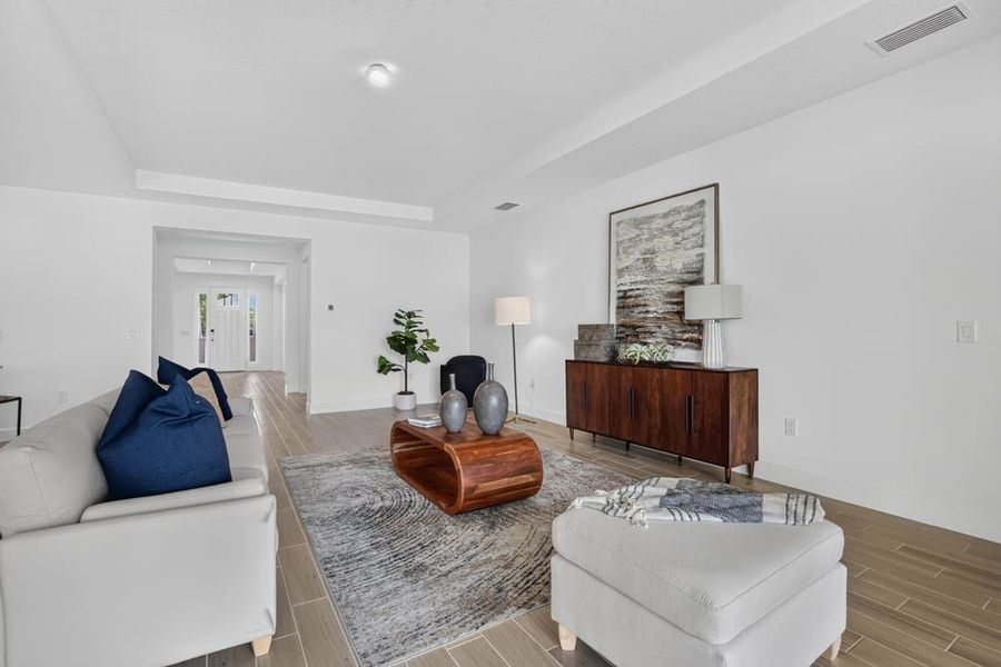 Representative furnished interior of a home built from the Abaco by Taylor Morrison in Ardisia Park, New Smyrna Beach (Image 11).