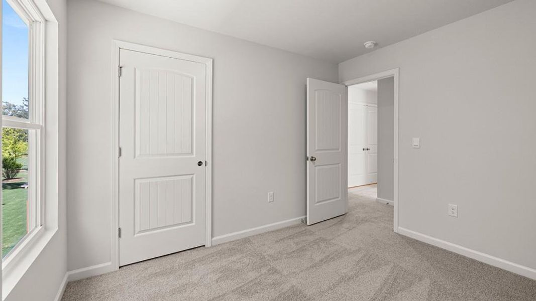 Spacious, unfurnished interior of a new home in Carlton, Douglasville (Image 18).