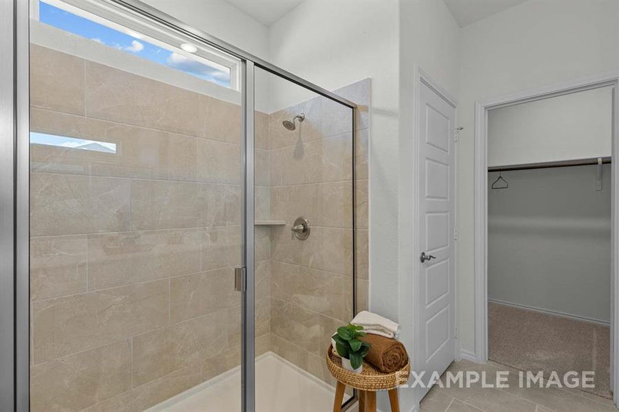 Bathroom featuring walk in shower