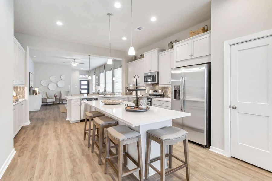 Representative furnished interior of a home built from the Adele by Chesmar Homes in Legacy at Lake Dunlap, New Braunfels (Image 5). Representative furnished interior of a home built from the Adele by Chesmar Homes in Legacy at Lake Dunlap, New Braunfels (Image 5).