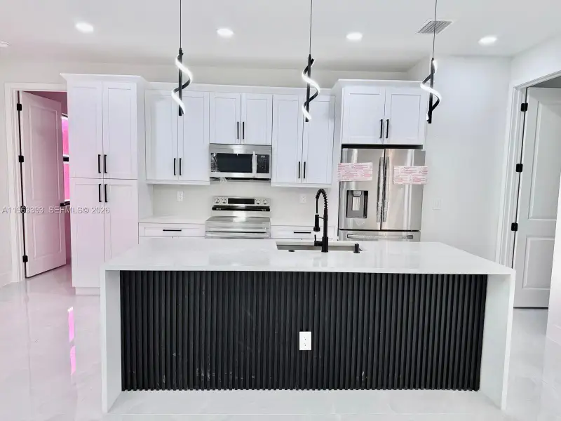 Furnished interior view inside a new home in , Lehigh Acres (Image 9).