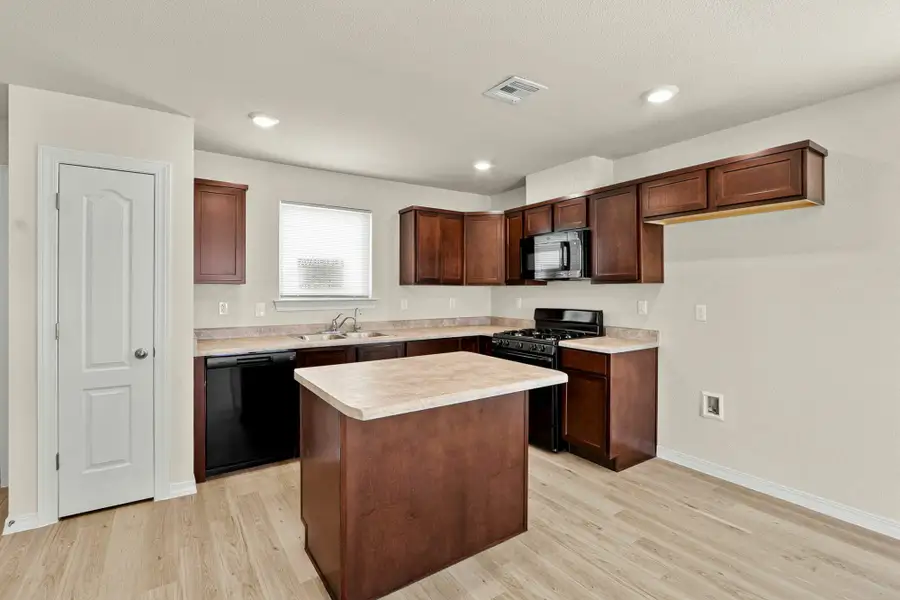 Furnished interior view inside a new home in Rancho Desierto Bello, Horizon City (Image 7).