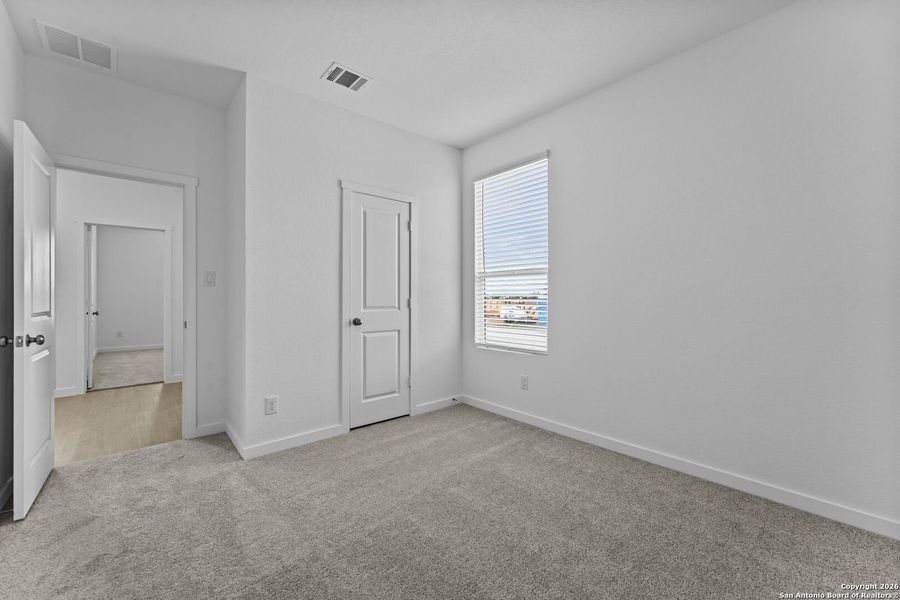 Spacious, unfurnished interior of a new home in Parkside: Coastline Collection, New Braunfels (Image 12).