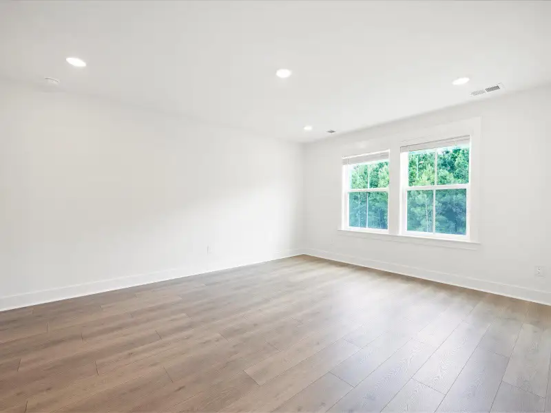 Spacious, unfurnished interior of a new home in The Coves at Lakes of Cane Bay, Summerville (Image 33). Spacious, unfurnished interior of a new home in The Coves at Lakes of Cane Bay, Summerville (Image 33).