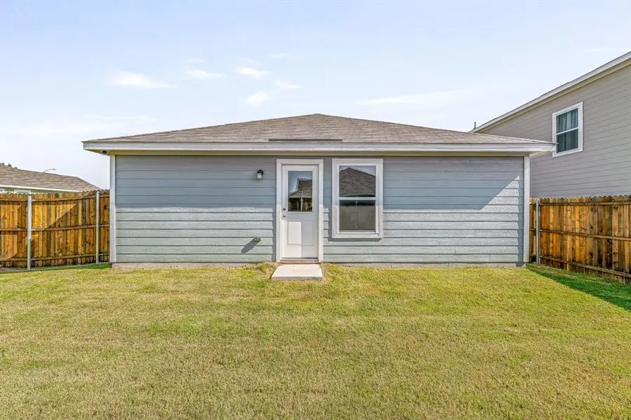 Front exterior of a new home in South Oak Grove: Cottage Collection, Fort Worth, TX, highlighting curb appeal (Image 2). Front exterior of a new home in South Oak Grove: Cottage Collection, Fort Worth, TX, highlighting curb appeal (Image 2).