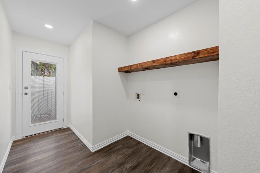 Laundry room featuring electric dryer hookup, dark wood-type flooring, hookup for a washing machine, and recessed lighting Laundry room featuring electric dryer hookup, dark wood-type flooring, hookup for a washing machine, and recessed lighting