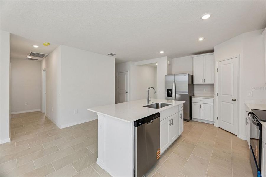 Furnished interior view inside a new home in Wynnstone - Signature Series, Davenport (Image 10).