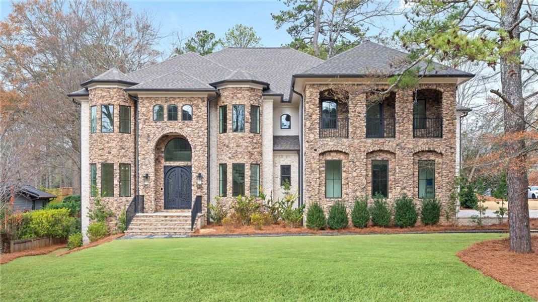 Front exterior of a new home in , Brookhaven, GA, highlighting curb appeal (Image 1). Front exterior of a new home in , Brookhaven, GA, highlighting curb appeal (Image 1).