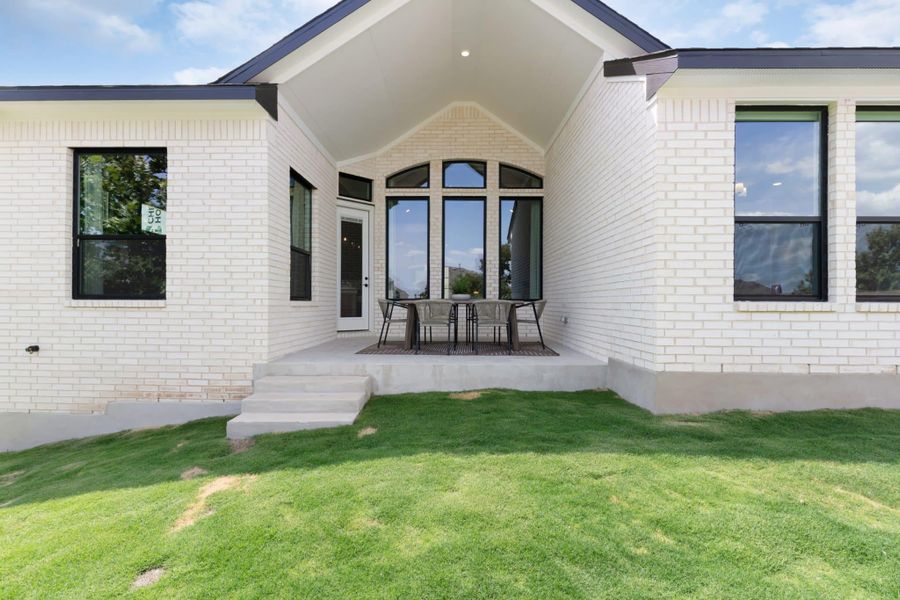 Representative exterior photo of a completed home built from the Branford by Chesmar Homes in Highland Village, Georgetown, TX (Image 2).