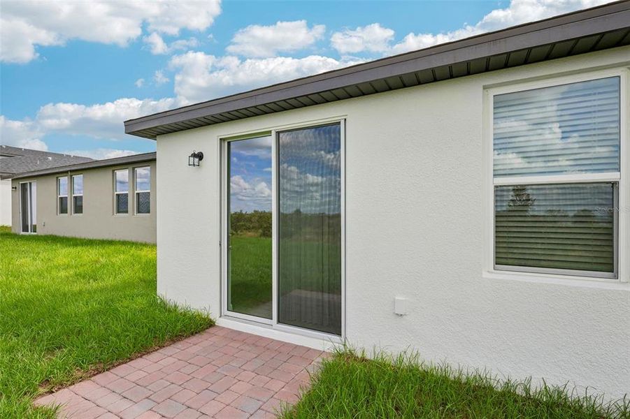 Exterior details and patio area of a home in Hamilton Bluff - Signature Series, Lake Hamilton (Image 3).