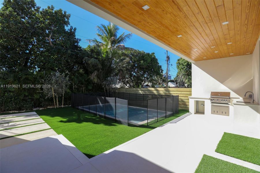 Exterior details and patio area of a home in , Miami (Image 3).