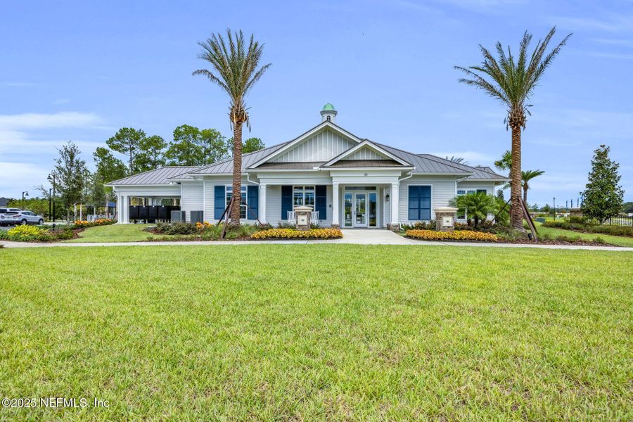 Front exterior of a new home in Summer Bay at Grand Oaks, St. Augustine, FL, highlighting curb appeal (Image 23).