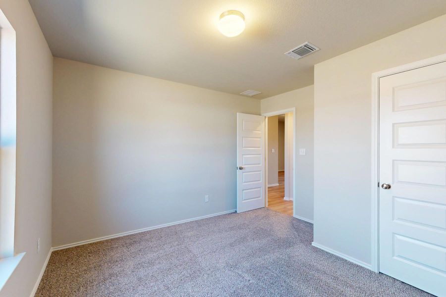 Spacious, unfurnished interior of a new home in Carillon, Manor (Image 29).