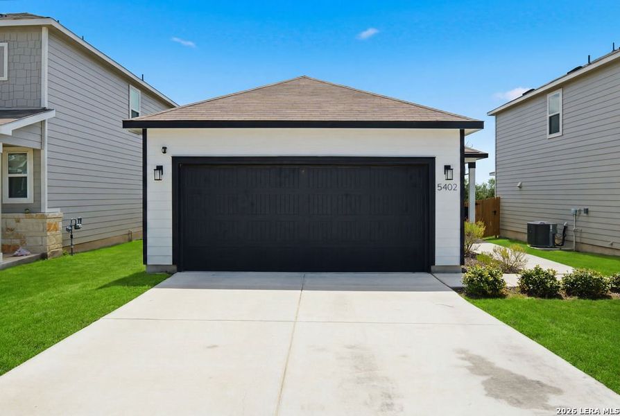 Front exterior of a new home in Blue Ridge Ranch, San Antonio, TX, highlighting curb appeal (Image 20).