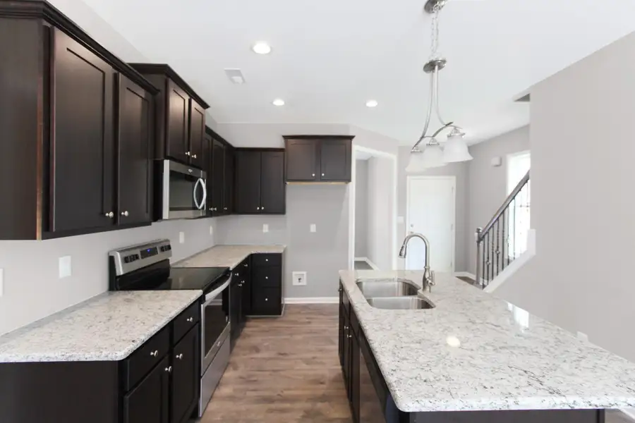 Representative furnished interior of a home built from the Furyk by RiverWILD Homes in Riverwood Ranch, Clayton (Image 9).