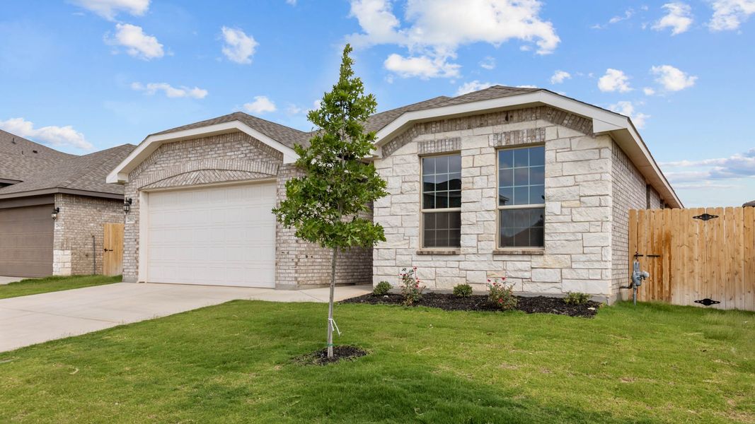 Front exterior of a new home in Northwest Passage, Midland, TX, highlighting curb appeal (Image 2).