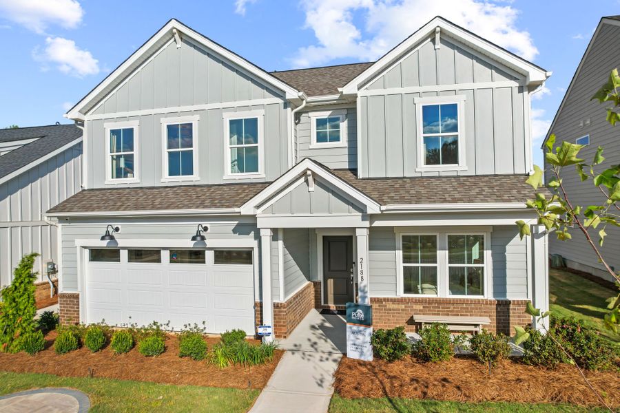 Representative exterior photo of a completed home built from the Austin by Pulte Homes in The Retreat at Carolina Ridge, Harrisburg, NC (Image 29). Representative exterior photo of a completed home built from the Austin by Pulte Homes in The Retreat at Carolina Ridge, Harrisburg, NC (Image 29).