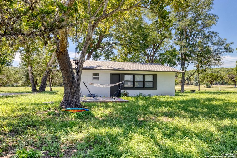 Front exterior of a new home in , Leakey, TX, highlighting curb appeal (Image 18).