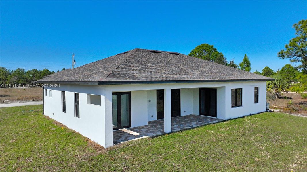 Exterior details and patio area of a home in , Lehigh Acres (Image 37). Exterior details and patio area of a home in , Lehigh Acres (Image 37).