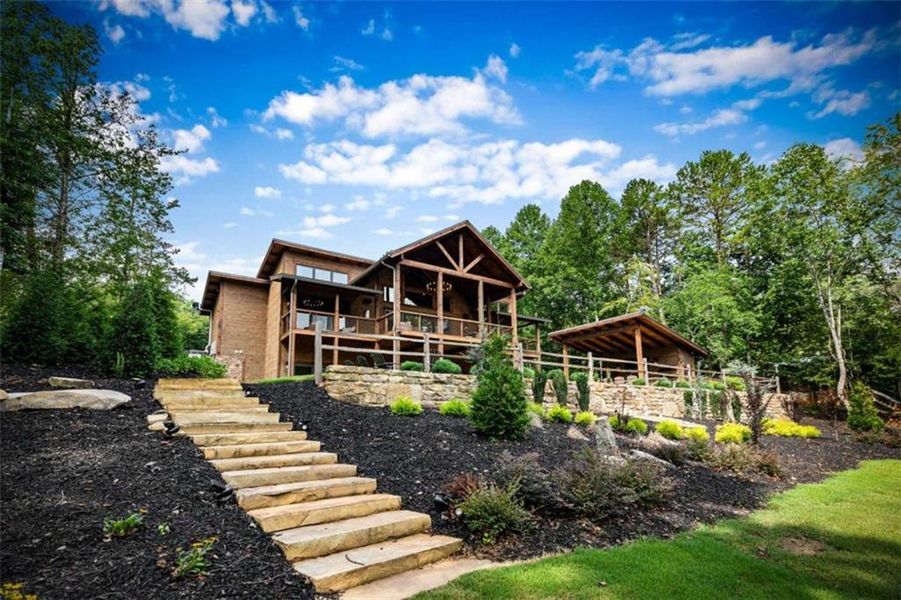 Front exterior of a new home in , Epworth, GA, highlighting curb appeal (Image 20).