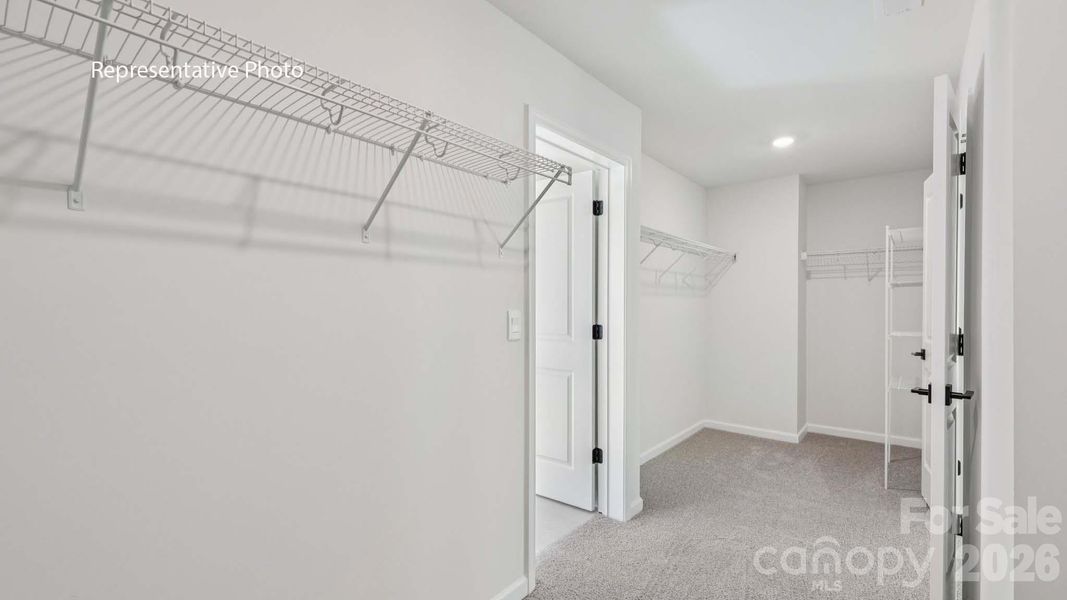 Spacious, unfurnished interior of a new home in Sanctuary at Southgate, Indian Trail (Image 28).