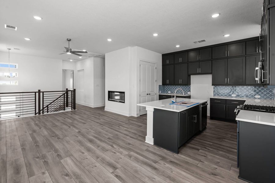 Furnished interior view inside a new home in Centero at Stone Oak, San Antonio (Image 8).