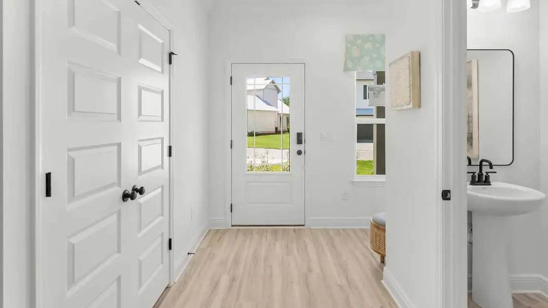 Representative unfurnished interior of a home built from the Monroe by D.R. Horton in Crest Bay Cottages, Miramar Beach (Image 21). Representative unfurnished interior of a home built from the Monroe by D.R. Horton in Crest Bay Cottages, Miramar Beach (Image 21).