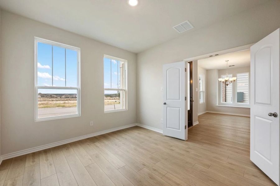Spacious, unfurnished interior of a new home in The Cottages at Lariat, Liberty Hill (Image 23).