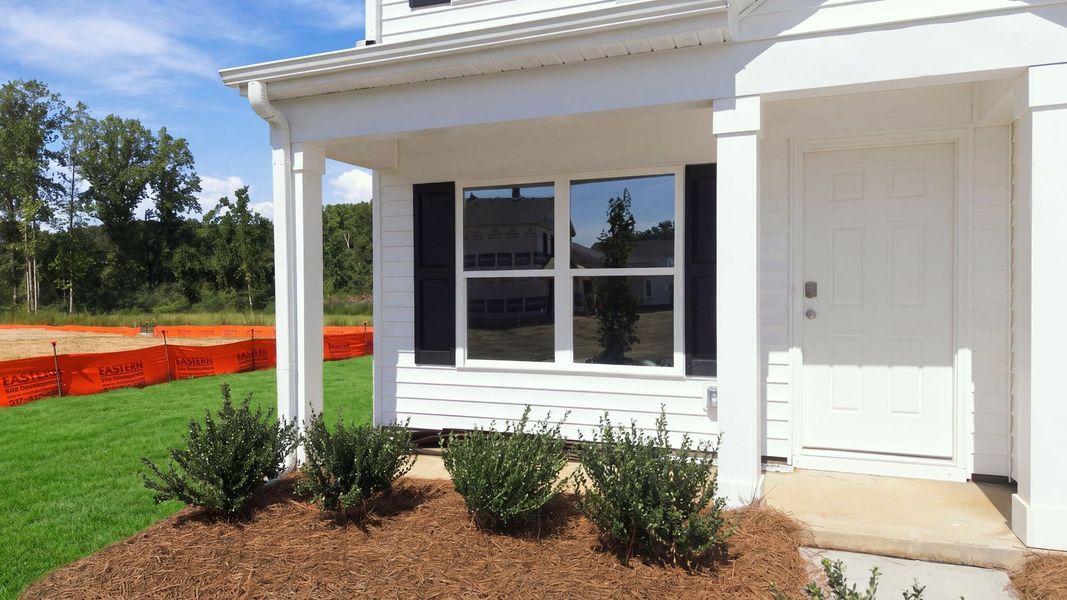Exterior details and patio area of a home in Hobbs Farm, Ayden (Image 3).