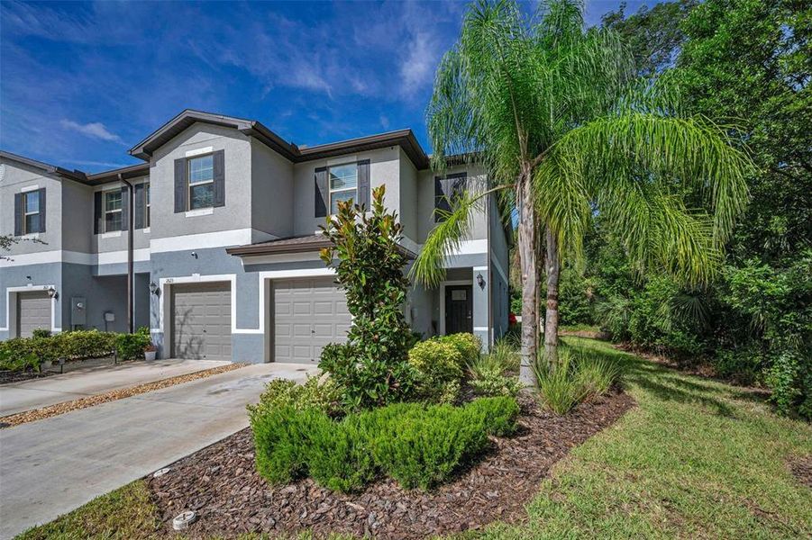 Front exterior of a new home in , Holiday, FL, highlighting curb appeal (Image 23).