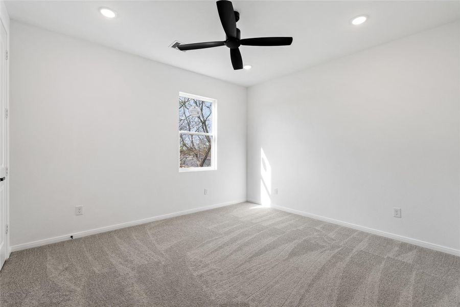 Generous secondary bedrooms with large windows that bring in natural light