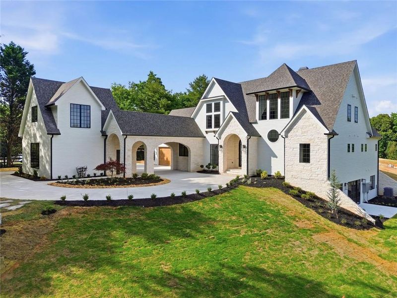 Front exterior of a new home in , Canton, GA, highlighting curb appeal (Image 33).