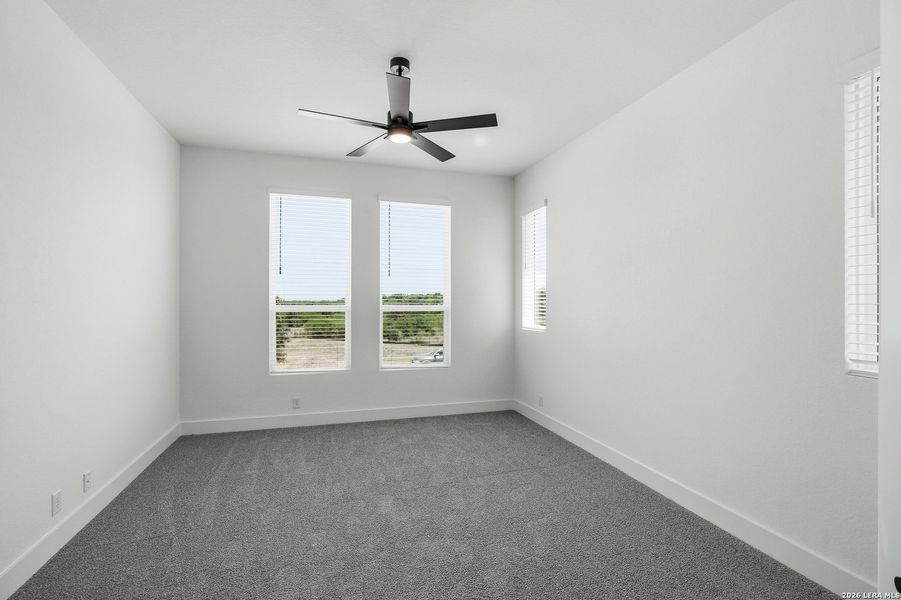Spacious, unfurnished interior of a new home in Centero at Stone Oak, San Antonio (Image 19).