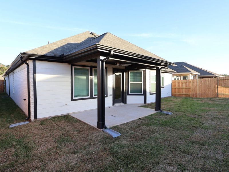Exterior details and patio area of a home in Magnolia Ridge, Magnolia (Image 22).
