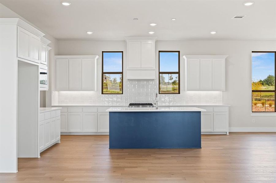 Furnished interior view inside a new home in The Heights at Uptown Celina, Celina (Image 5). Furnished interior view inside a new home in The Heights at Uptown Celina, Celina (Image 5).