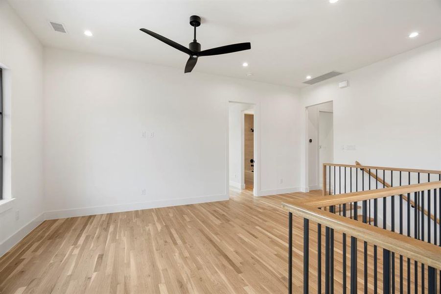 Upstairs Loft featuring light wood-style floors, recessed lighting, and ceiling fan Upstairs Loft featuring light wood-style floors, recessed lighting, and ceiling fan