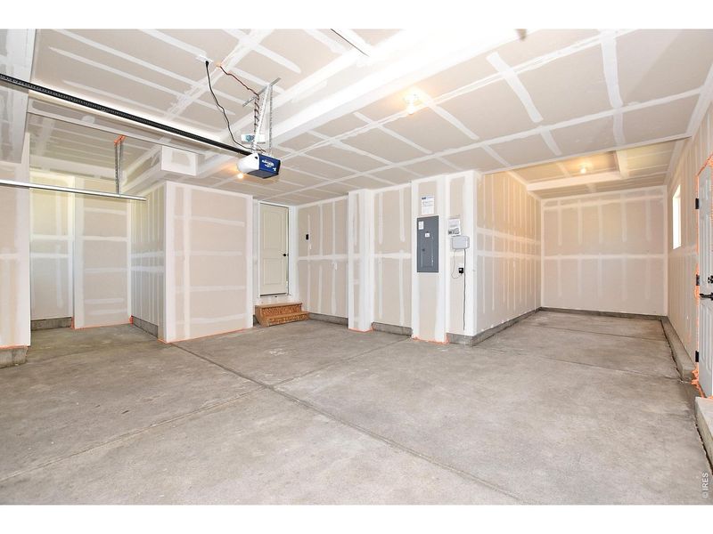 Spacious, unfurnished interior of a new home in Union Colony West, Greeley (Image 24).