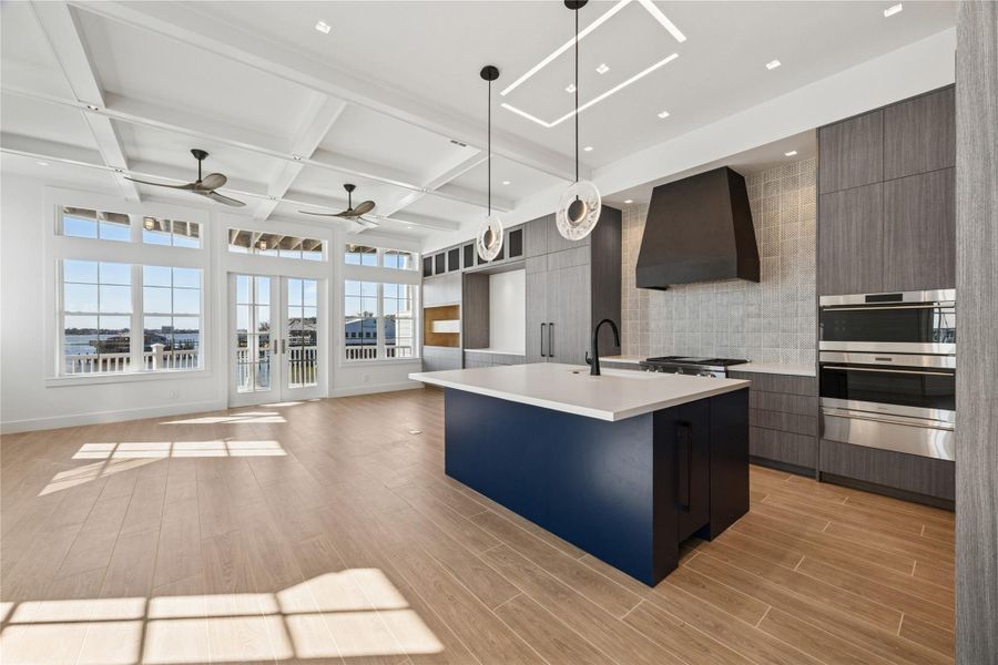 Beautiful kitchen with Wolf appliances and plenty of storage.  Enjoy expansive views of Clear Lake while cooking and entertaining guests on the front patio.